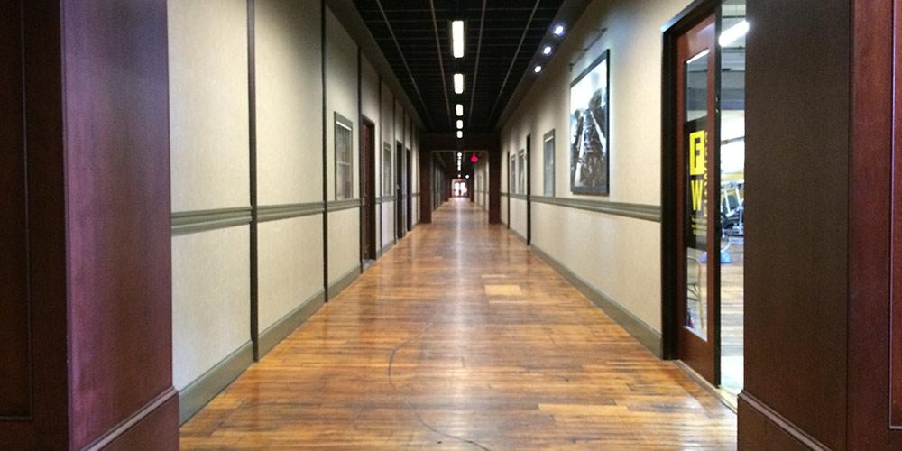 What is now a long hallway with office spaces was once a big open space.